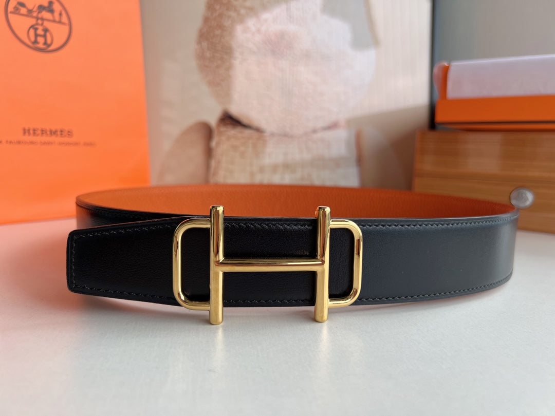 HERMES ROYAL BELT BUCKLE & REVERSIBLE NOIR AND ORANGE LEATHER STRAP 32 MM GOLD HARDWARE