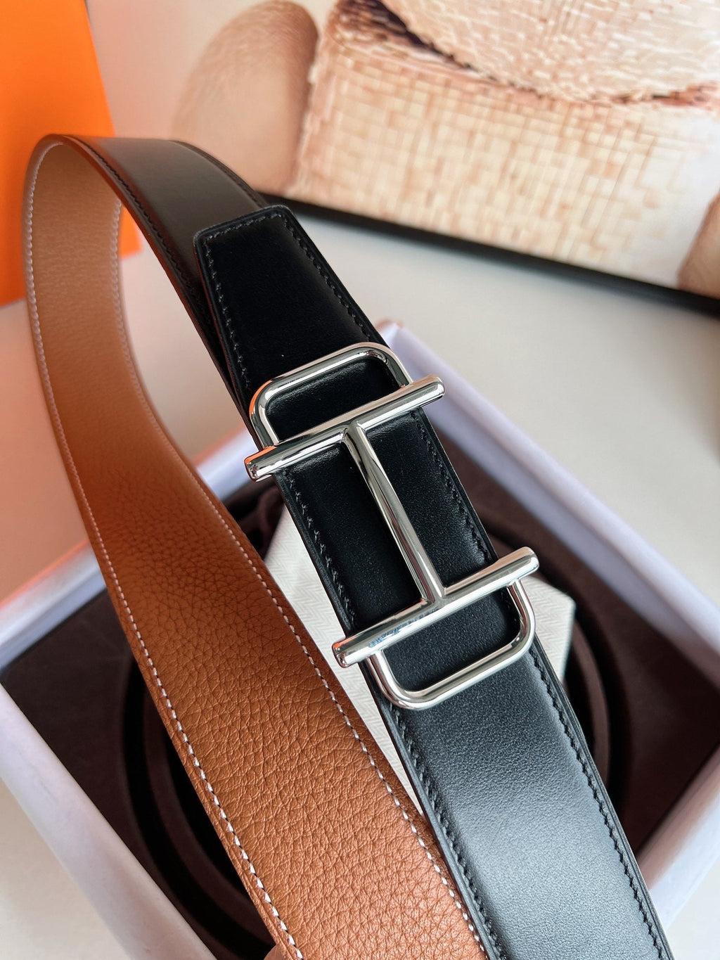 HERMES ROYAL BELT BUCKLE & REVERSIBLE NOIR AND CIDER ORANGE LEATHER STRAP 32 MM SILVER HARDWARE