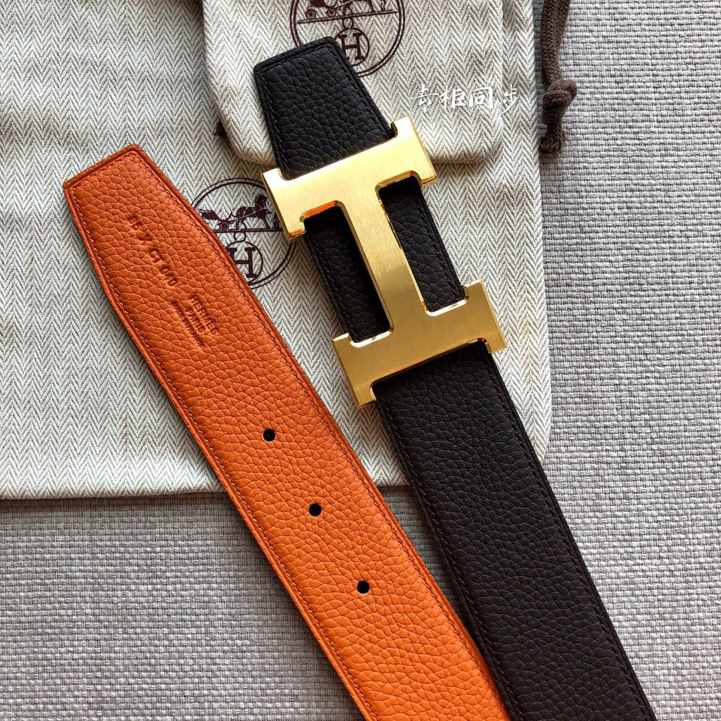 HERMES BELT BUCKLE & REVERSIBLE BLACK AND ORANGE LEATHER STRAP 38MM GOLD HARDWARE