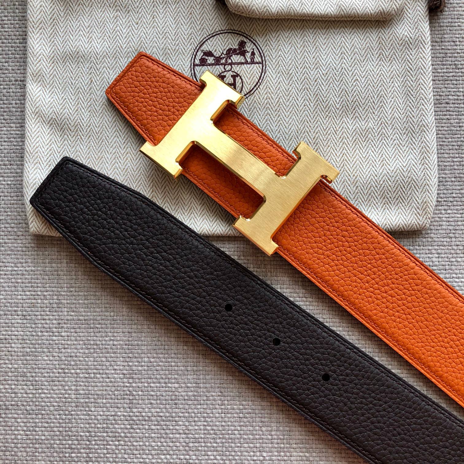 HERMES BELT BUCKLE & REVERSIBLE BLACK AND ORANGE LEATHER STRAP 38MM GOLD HARDWARE