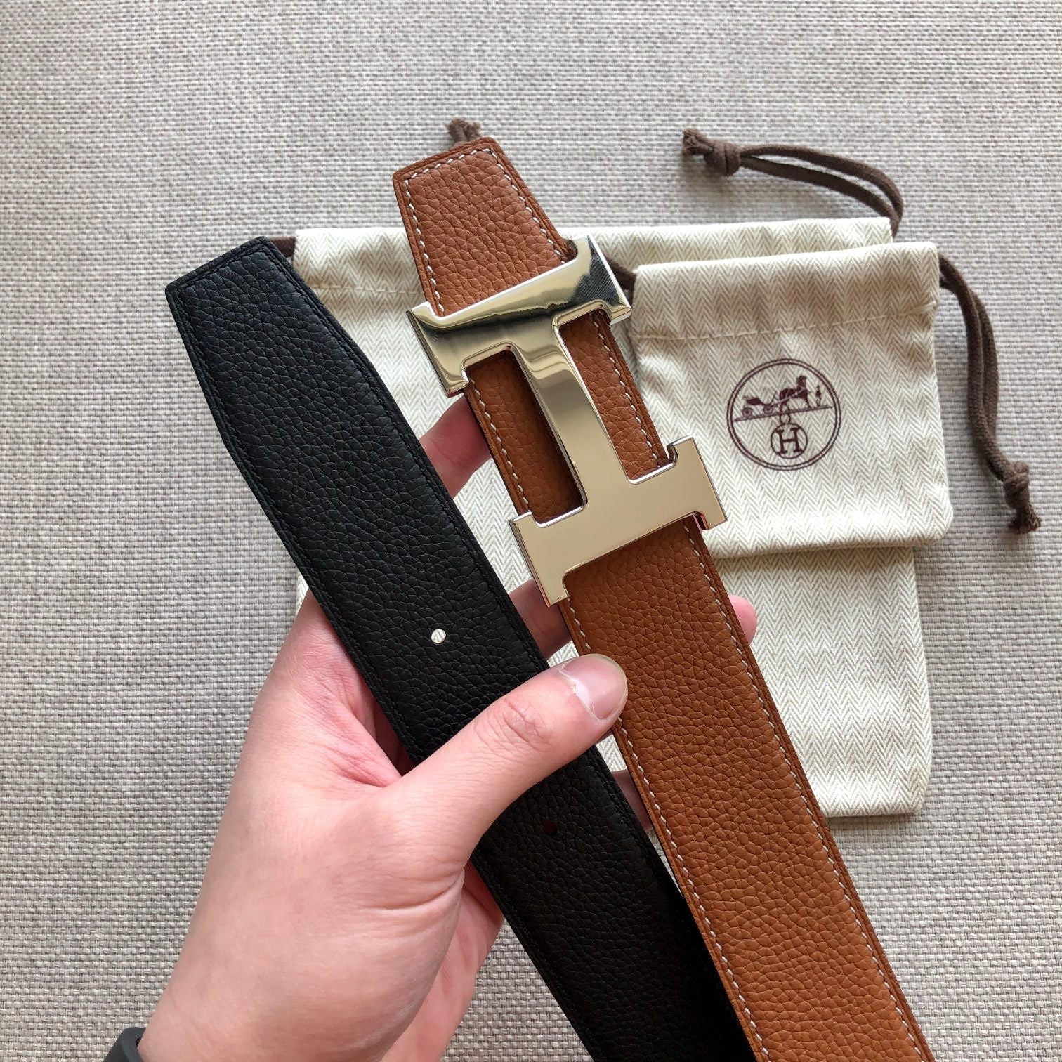 HERMES BELT BUCKLE & REVERSIBLE BLACK AND BRONZE BROWN LEATHER STRAP 38MM GOLD HARDWARE