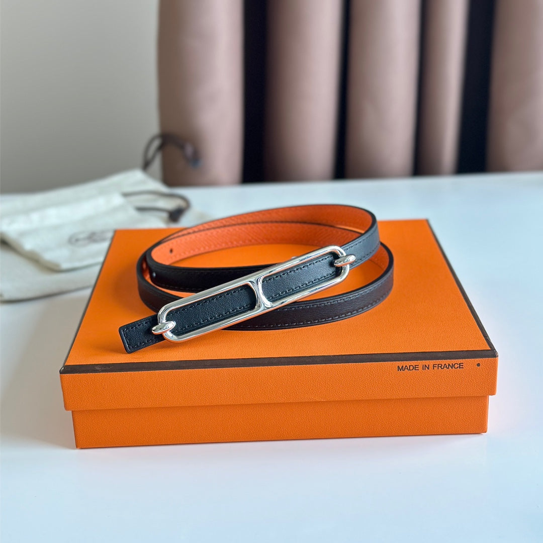 HERMES ROULIS BUCKLE & REVERSIBLE ORANGE AND BLACK LEATHER STRAP 13MM SILVER HARDWARE
