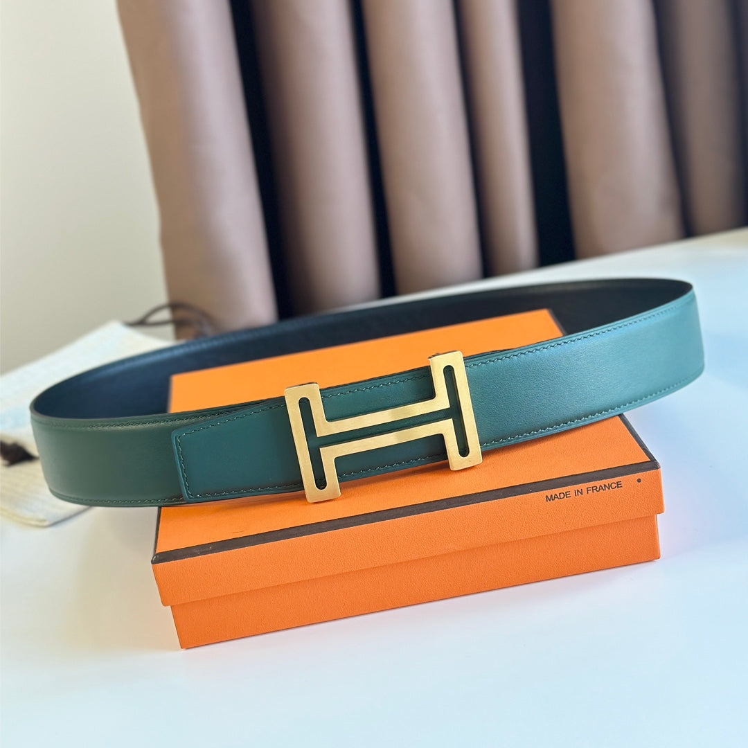 HERMES BELT BUCKLE & REVERSIBLE TEAL GREEN AND BLACK LEATHER STRAP 38MM GOLD HARDWARE