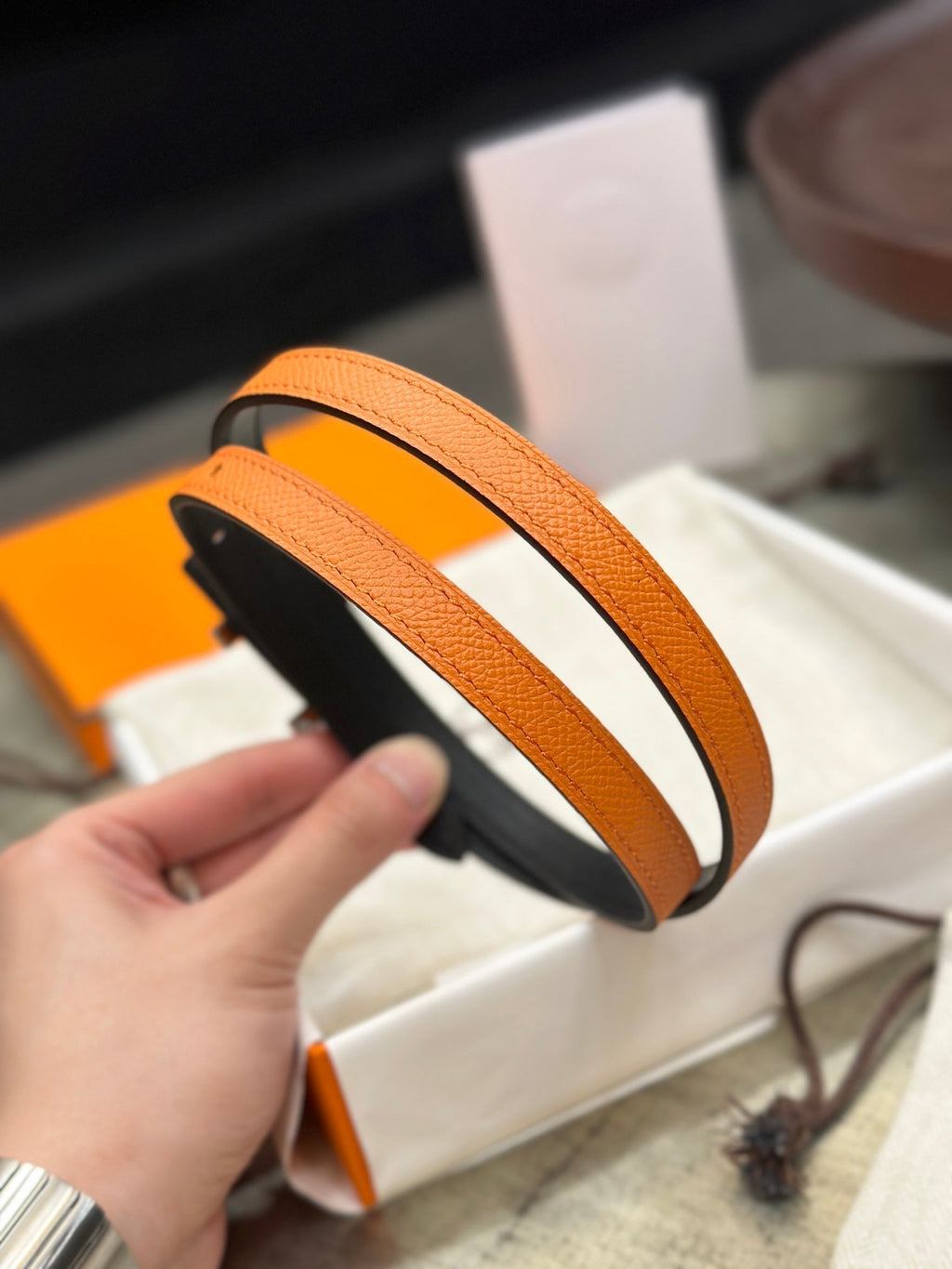 HERMES FOCUS BUCKLE & REVERSIBLE ORANGE AND BLACK LEATHER STRAP 13MM SILVER HARDWARE