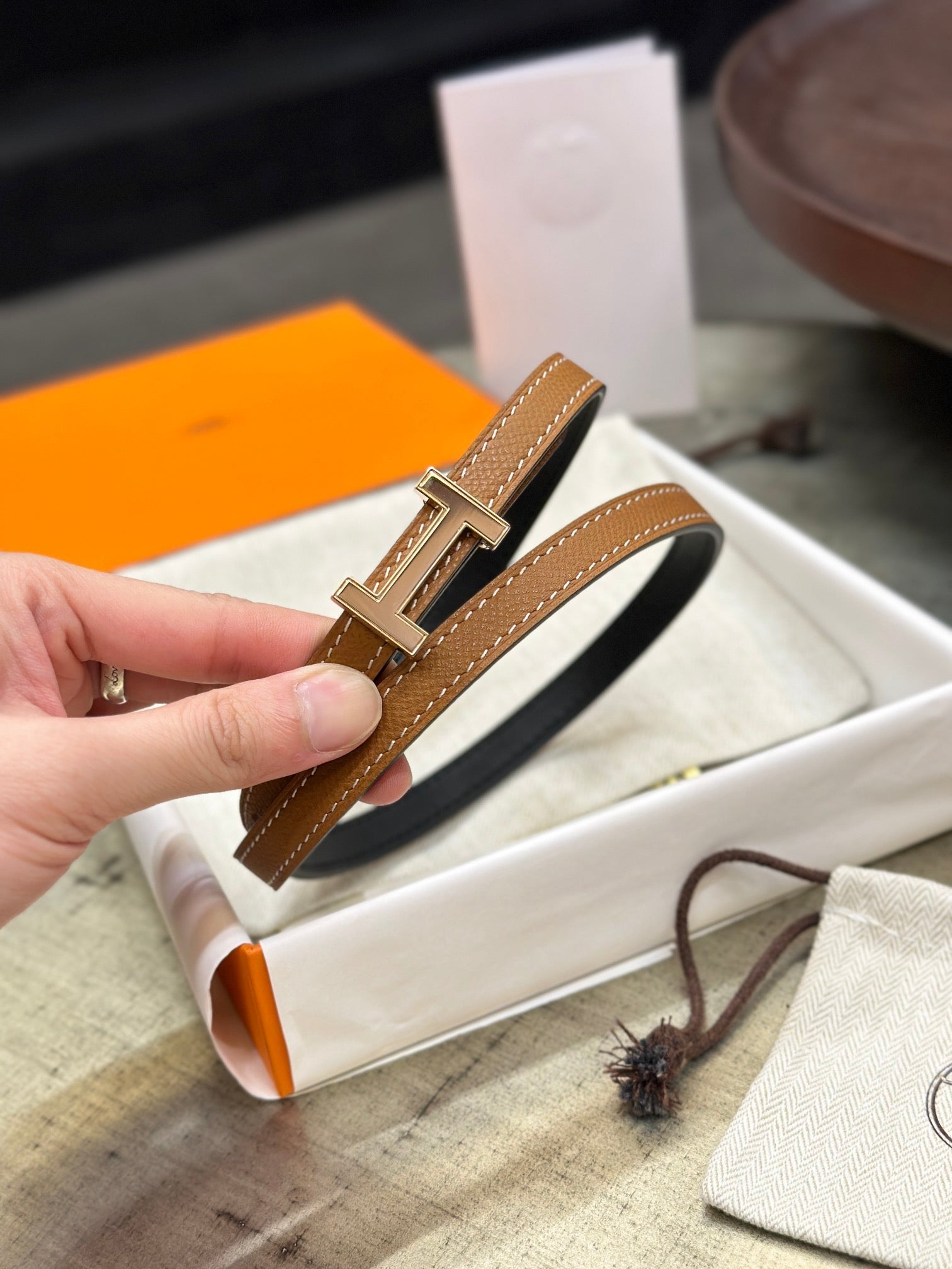 HERMES FOCUS BUCKLE & REVERSIBLE BLACK AND TAWNY BROWN LEATHER STRAP 13MM COPPER HARDWARE