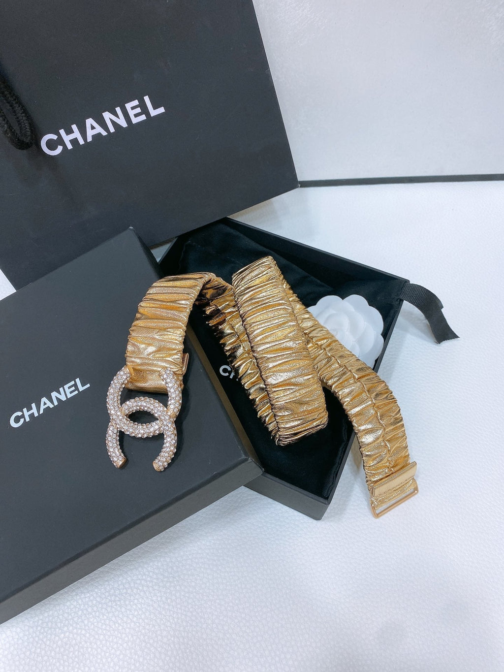 CHANEL ELASTIC BELT 30MM IN GOLD CALFSKIN GOLD HARDWARE WITH RHINSTONES