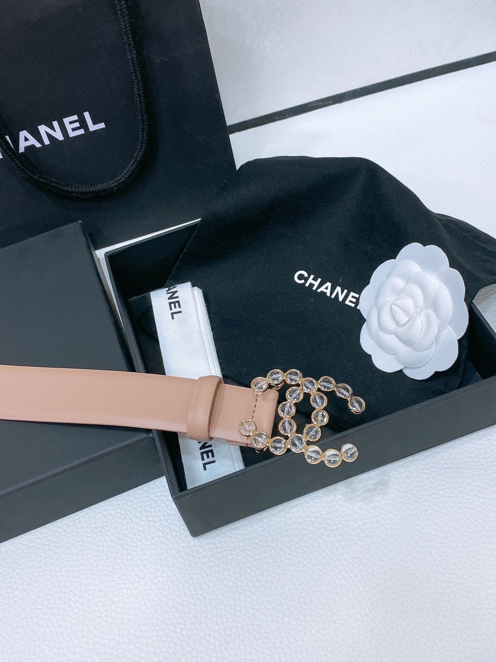 CHANEL BELT 30 MM IN ALMOND BEIGE CALFSKIN PEARL LOGO WITH GOLD HARDWARE