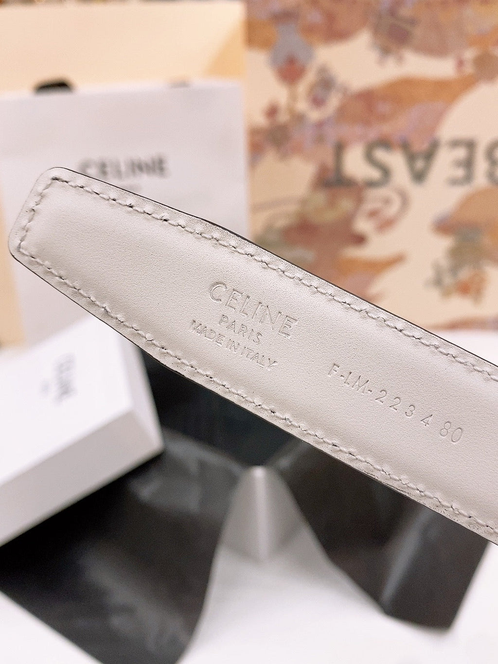 CELINE 25S BELT 25MM REVERSIBLE TRIOMPHE IN BLACK WHITE CALFSKIN 565542